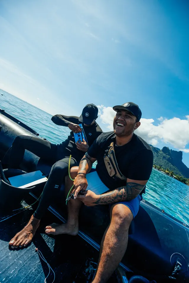 A Gardener laughing on the boat