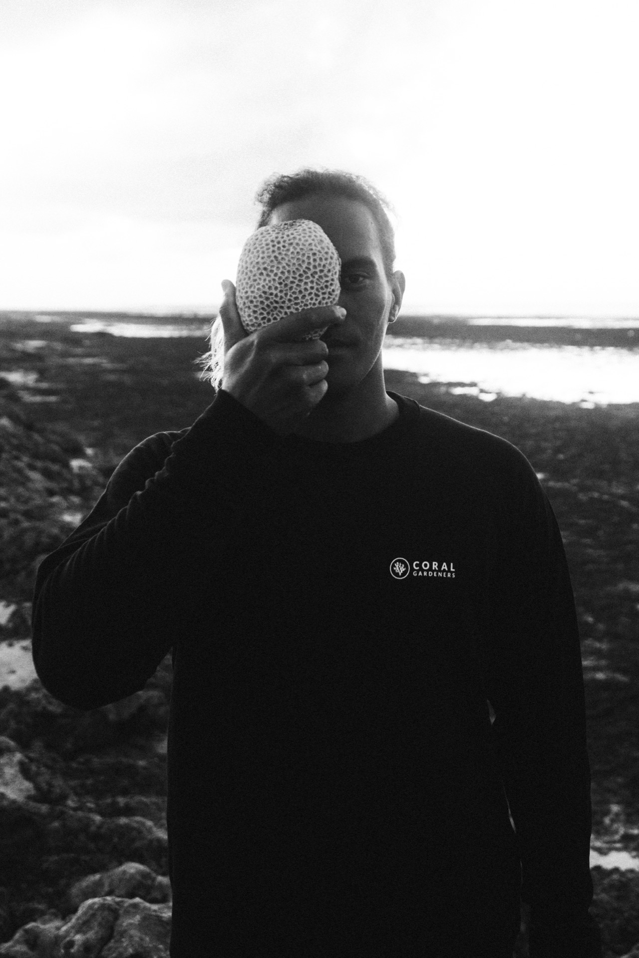 A Gardener behind a coral